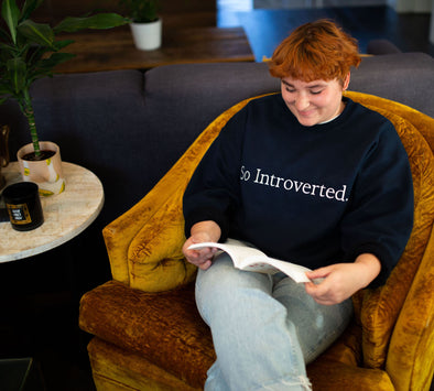 girl in 'So introverted' crewneck